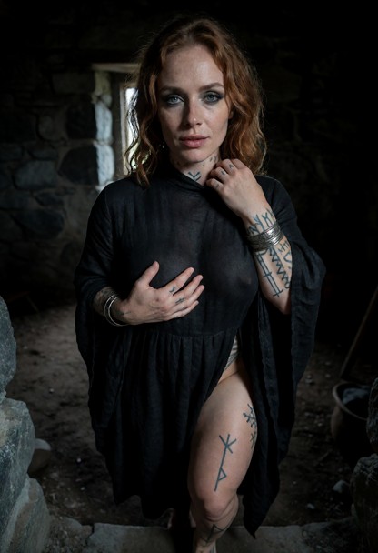 Location: dim interior of a stone cabin with rough rock walls and a packed dirt floor, where the faint, cold light fr…