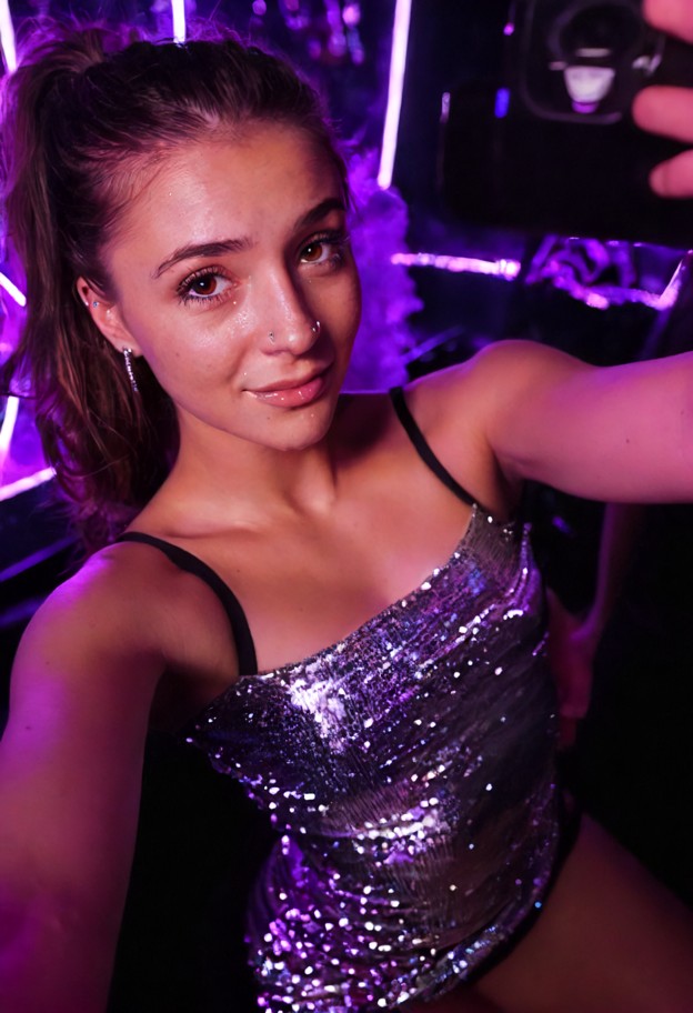 she is is crying in a nightclub,silver sequin mini dress,crowded nightclub,neon purple lights,blurry figures,selfie c…