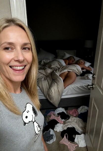 A first-person perspective (POV) taken from a doorway looking into a dark, messy bedroom. In the immediate foreground…
