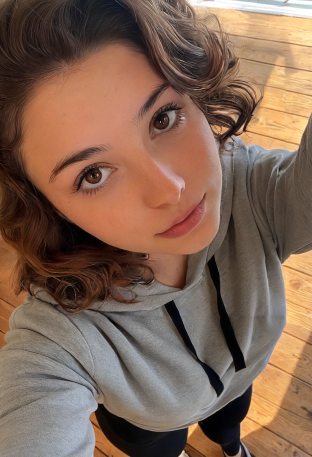 standing close and looking up,gray hoodie,black leggings,dusty attic,wooden floorboards,afternoon light,selfie closeu…