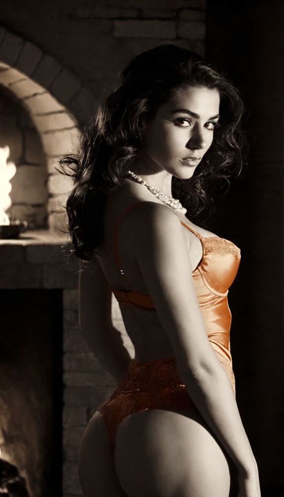 vintage noir photograph of a woman in burnt-orange satin lingerie,standing near a crackling fireplace,film noir light…