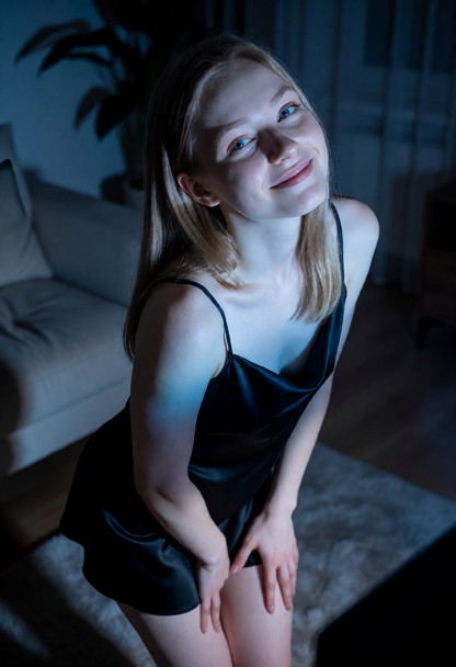 Location: dim living room in the middle of the night, lit only by the soft, flickering blue glow of the television sc…
